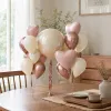 A combination of golden and off-white balloons is used to decorate wedding party and celebration Settings, creating an atmosphere and providing decorative items details Picture